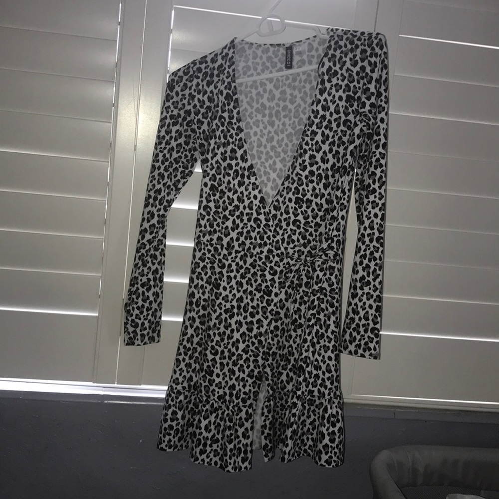 Dress with long sleeve. Gorgeous dress! Never worn